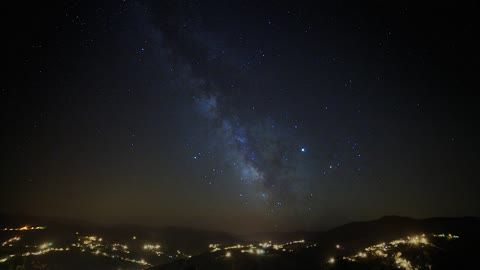 The milky way over the city lights