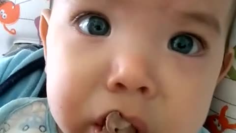 baby eating barbecue