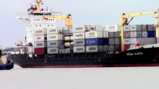 Container ship making its 360 degrees turn in Thailand