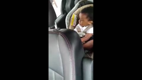 Adorable little boy preciously sings a song