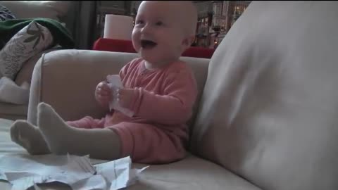 Baby Laughing hysterically at ripping paper