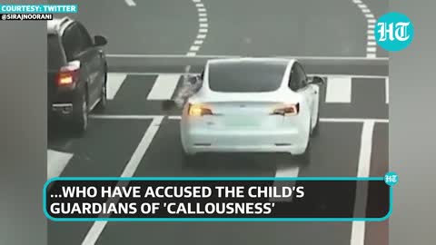 Child falls out of car at busy road junction in China,