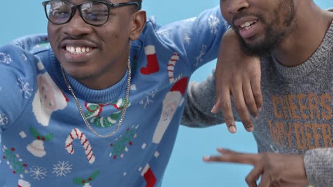 video men wearing christmas sweater on a video call