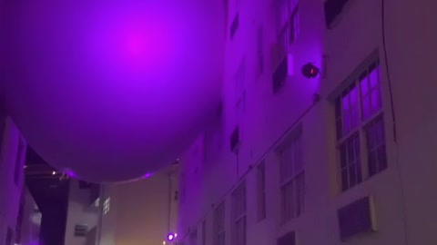 Buildings Connected by Giant Balloon