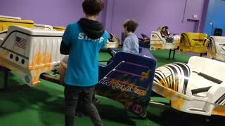 Spencer riding mini roller coaster at @Play VID_20180422_145321