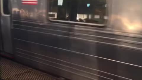 D train running on the F line