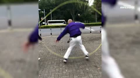 An old man jumping over Rope.