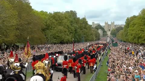 Queen's coffin arrives at Windsor Castle.