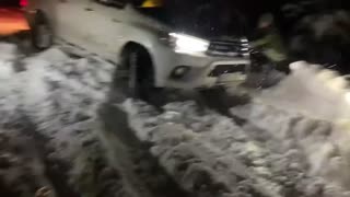 Toyota Hilux stuck in Snow
