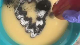 Mixing colorant into soap batter