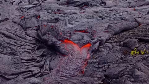 Fountain of liquid magma ejections - magma stream - magma spring of gushing lava emitting.
