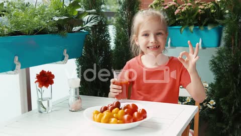 Girl_drinking_tomato...review