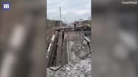 Wreckage of bridge over Dnieper River that was blown up close to Kyiv