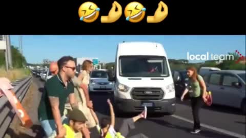 Watch Italians Deal With Global Warming Protesters In The Middle Of The Road