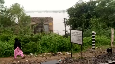 Train with Rain flow at bridge River Chambal