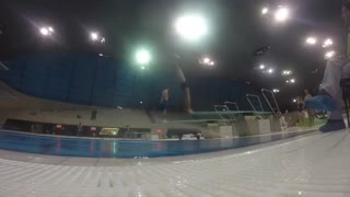 Indoor pool triple bellyflop