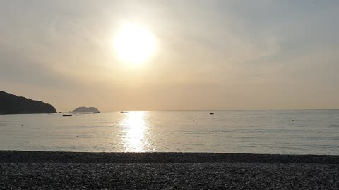 The sound of the sea in a calm morning.