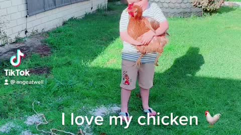 Boy and his chicken