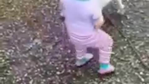 Funny baby playing with animals