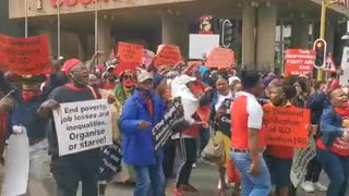 Cosatu members march in Johannesburg