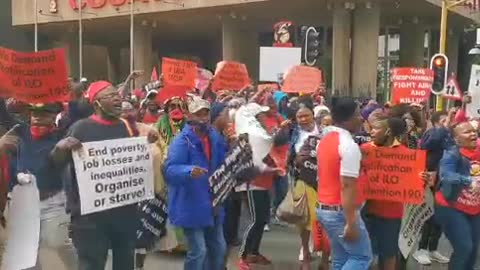 Cosatu members march in Johannesburg