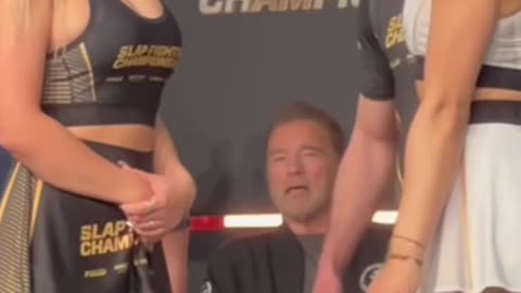 Arnold Schwarzenegger enjoy slap fight ladies