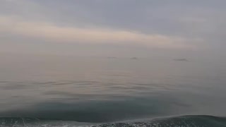 a view of the sea from the top of a ship