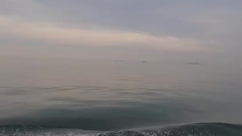 a view of the sea from the top of a ship