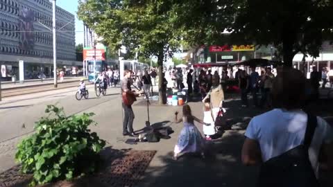 Epic street singer performing