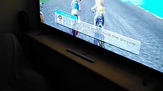 My 5 year old nephew playing Wii sports resort on the Nintendo Wii
