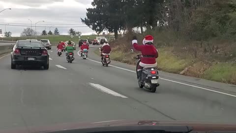 Dressed up for Christmas on motorcycles!