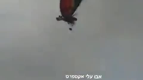 Stunning footage of Hamas infiltrator from Gaza using a motorized hang glider to fly into Israel