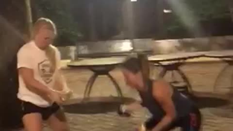 Two girls fail at smashing beers together to open it also struggle to drink it