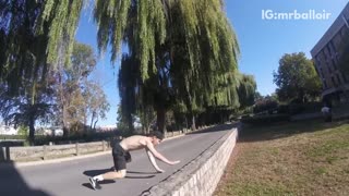 Shirtless guy back flip hits face on sidewalk