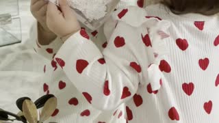 Baby Gives Herself a Kiss in a Mirror