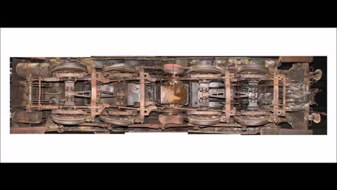 Filmmaker documents difficulties of filming underneath locomotive