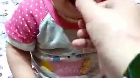 The anger of the girl for eating the peanut with its peel