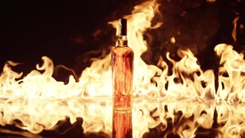 Whisky Bottle and Fire Background