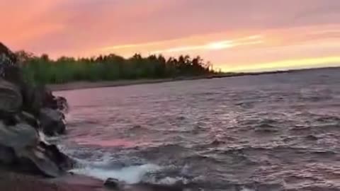 A Preview of a Sunset Over Lake Superior with Waves White Noise Video.