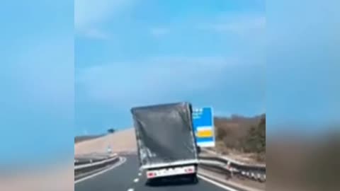 Crazy wind almost tips truck over