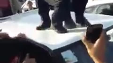 Ahmadinejad was lifted up by his bodyguard