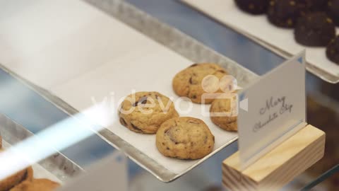 Cookies and sweets on display at a shop, close up