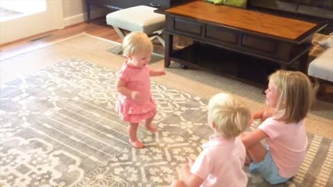 She is crying when she sees his sister walking for the first time
