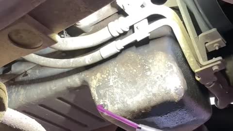 Car disassembly to drain oil