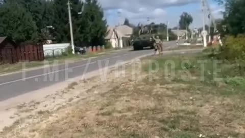 Akhmat Soldiers Drive Through Gir'i in a Captured BTR-4