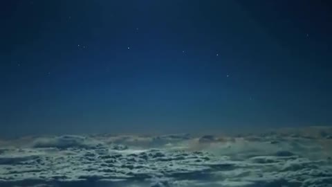 rare video of full moon above the clouds
