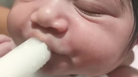 A cute hungry baby milk feeding💝