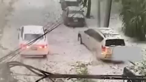 Rare hail hits streets in Mexico City