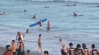 Surfer Surprised by Massive Wave