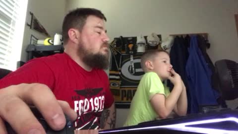 Father scares son with snake pop up scare